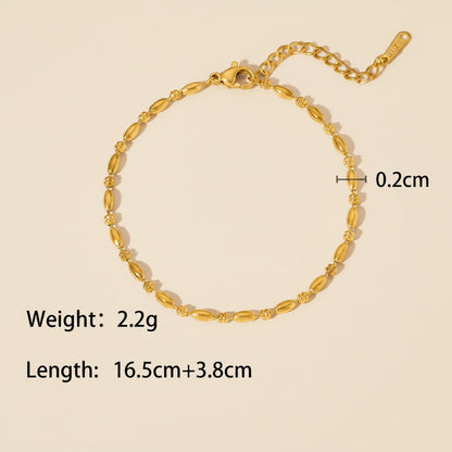 Seraphina Treasures Lumina gold bracelet with oval beads and adjustable chain, 0.2cm width.
